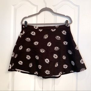 black flare skirt with white eye